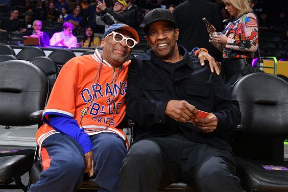 Spike Lee (L) and Denzel Washington attend a basketball game between the Los Angeles Lakers and the New York Knicks at Crypto.com Arena on March 12, 2023 in Los Angeles, California.
