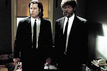 Pulp Fiction (Movie - 1994), John Travolta, ... | JULES WINNFIELD (Samuel L. Jackson) and VINCENT VEGA (John Travolta) Pulp Fiction More curious than France's Royale with cheese is the hit men's choice toÂ